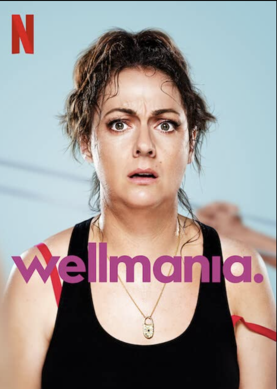 Liv looking confused and upset. She is sweaty ad her hair is a mess as she stares forward. Red bra straps fall down from under her black tank top. Across the middle of her body is the title in purple: wellmania.
